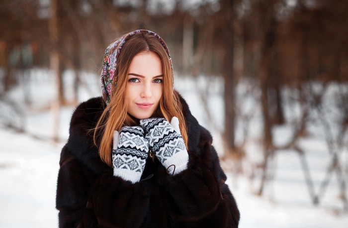 Woman in fur coat and headscarf in winter