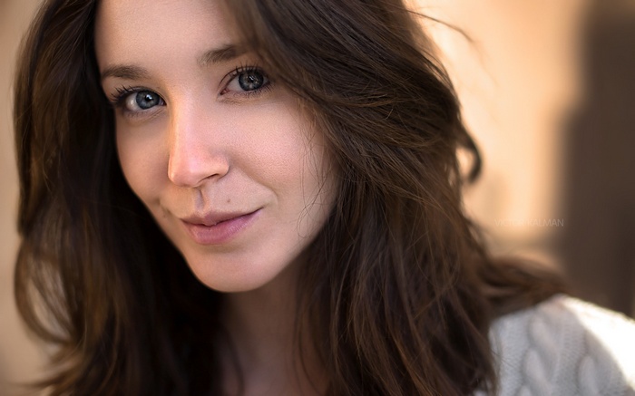 Portrait of a woman with long brown hair