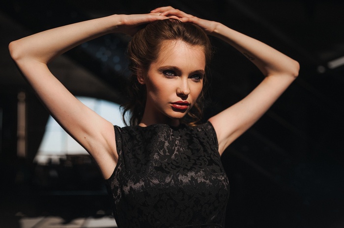 Model Christina Vostruhina in black dress