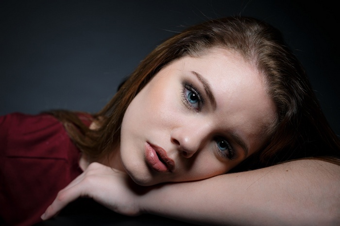 Woman with blue eyes and dark hair