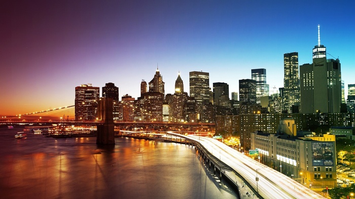 New York City skyline and Brooklyn Bridge at sunset