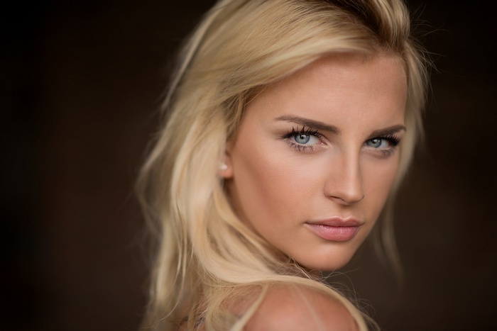 Portrait of a blonde woman with blue eyes
