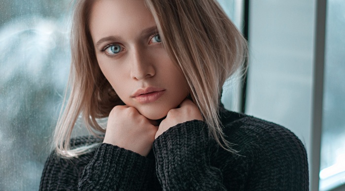 Portrait of a young woman with blonde hair