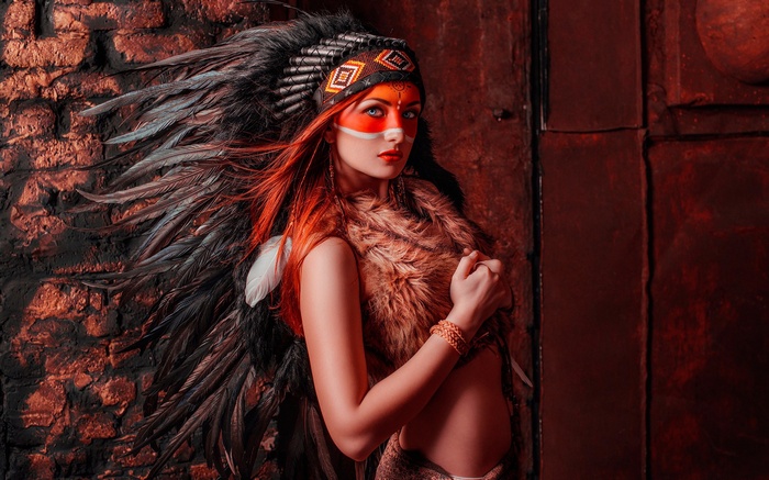 Woman with Native American headdress and face paint