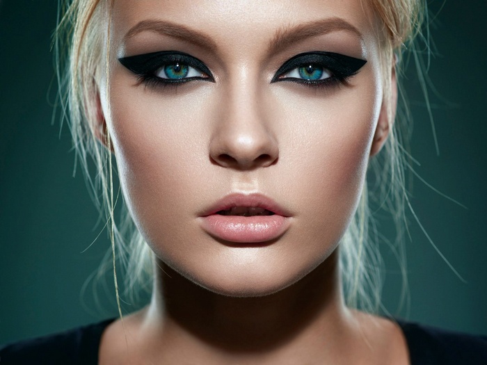 Woman with blue eyes and black eyeliner