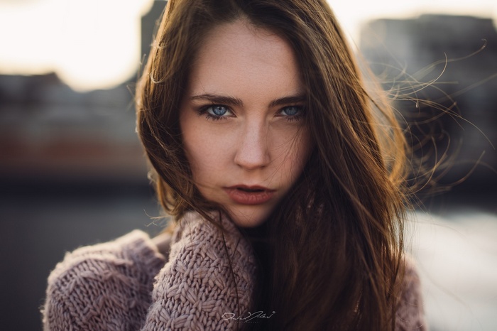 Portrait of a woman with blue eyes by David Milev