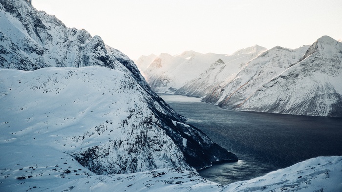 Snowy mountains and a fjord in Norway