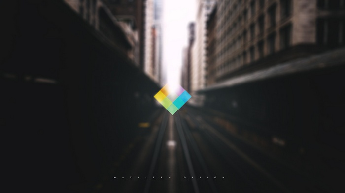 Matrizen Design logo over blurred city railway