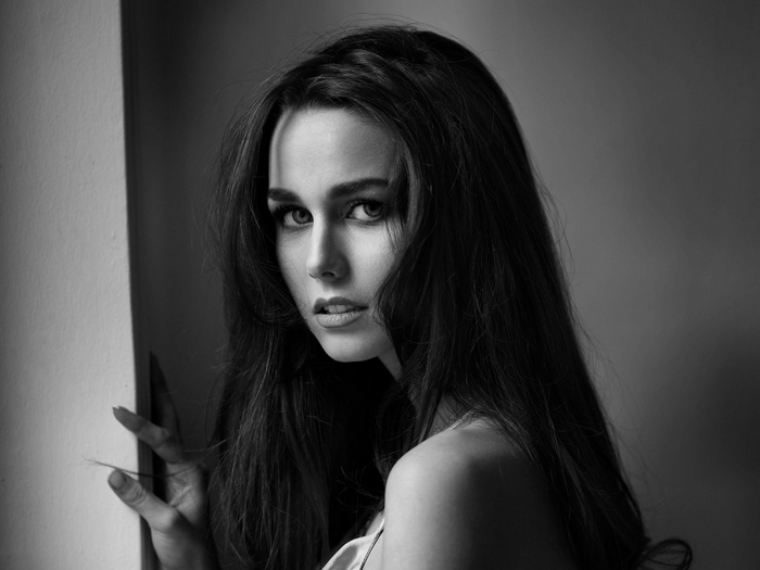 Monochrome portrait of a woman with long hair