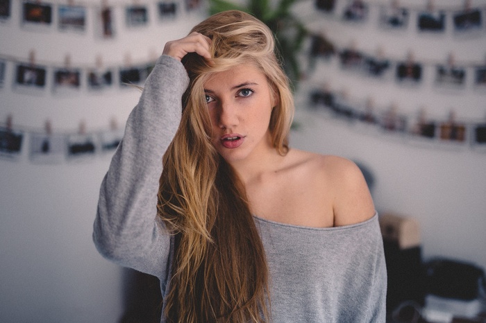 Woman with blonde hair and blue eyes