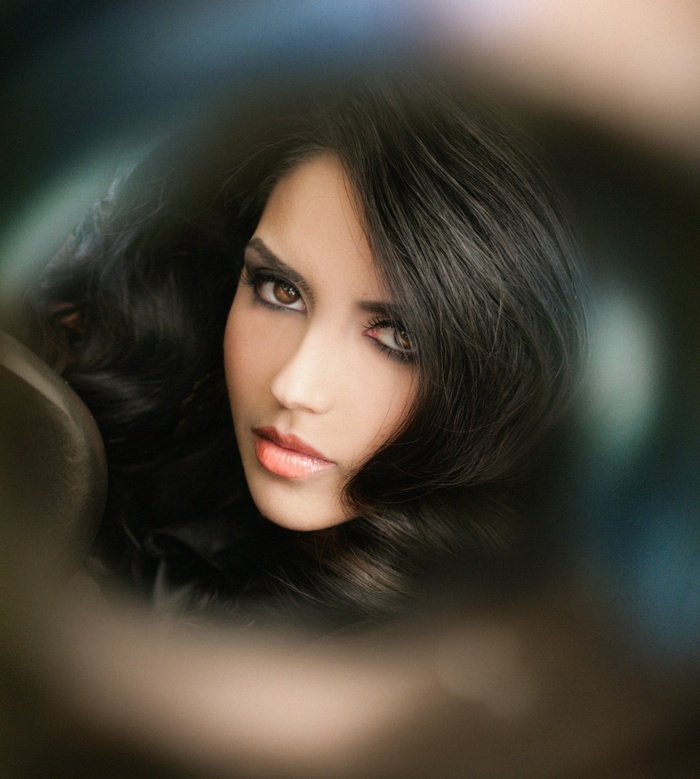 Model with dark hair and makeup