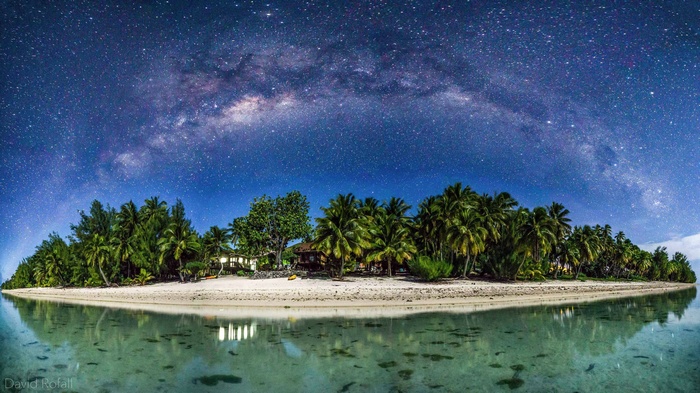 Island beach under the Milky Way at night