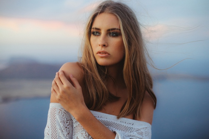 Woman with blonde hair outdoors