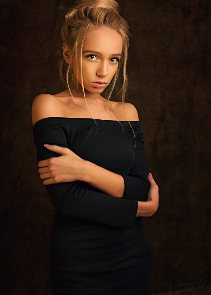 Portrait of a young woman by Sergey Fat