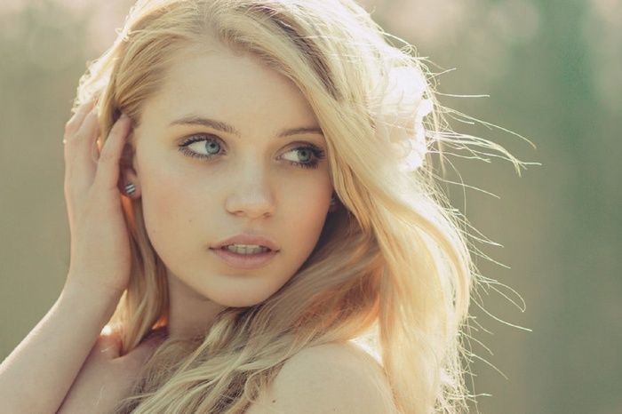 Portrait of a blonde woman with blue eyes