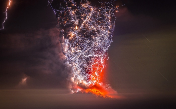 Volcanic lightning eruption at night