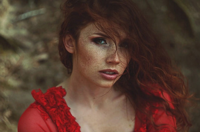 Michalina Cysarz with freckles wearing red