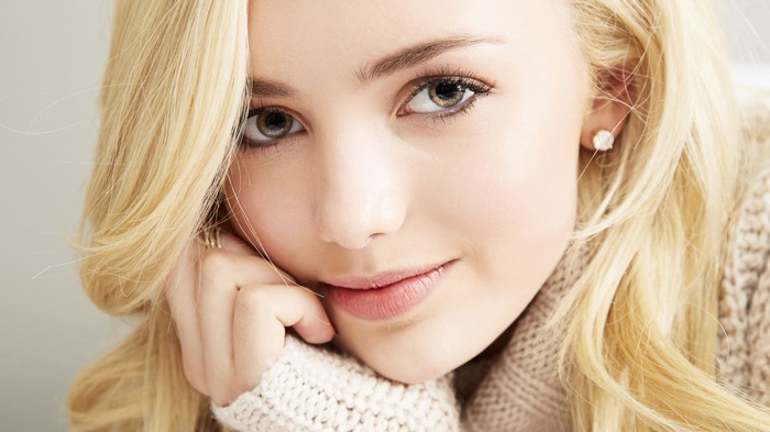 Peyton List portrait with blonde hair and brown eyes
