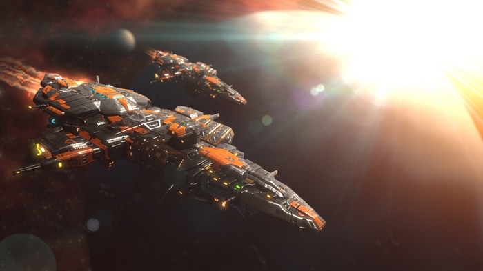 Two orange and black spaceships in space