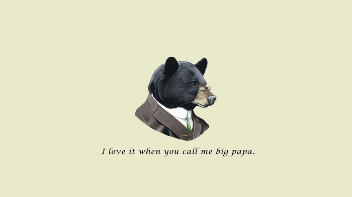 Bear in a suit with glasses and a quote