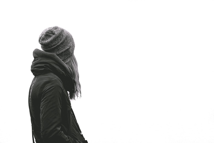 Woman wearing a beanie and jacket