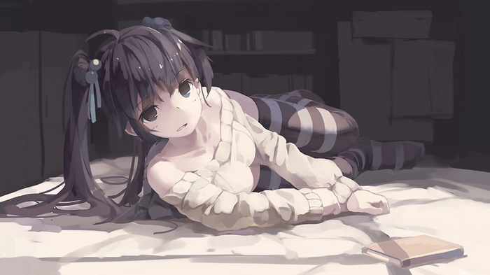 Anime girl with pigtails lying on a bed