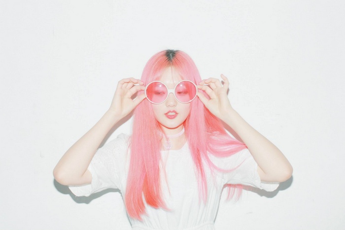 Rotta with pink hair and sunglasses