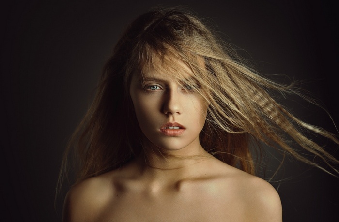 Portrait of a young woman with blonde hair