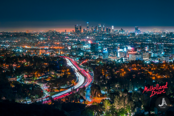 Los Angeles cityscape with Mulholland Drive light trails at night