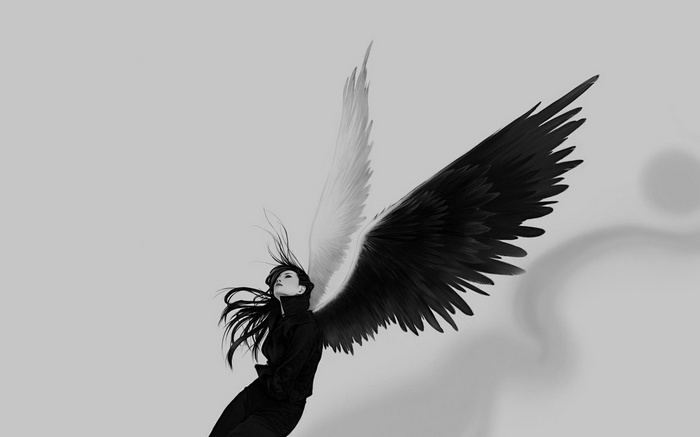 Monochrome drawing of an angel with black and white wings