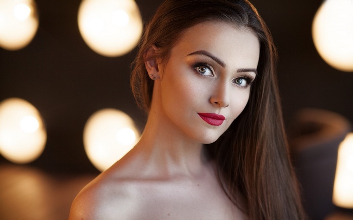 Woman with long hair and red lipstick
