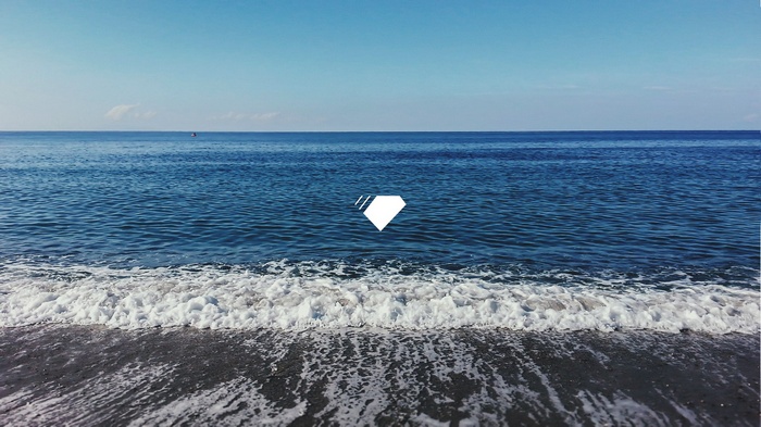 Ocean waves crashing on a sandy beach