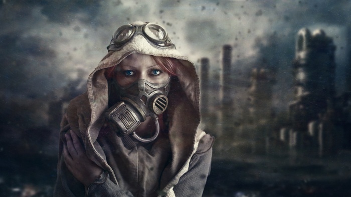 Woman in gas mask and goggles in apocalyptic city