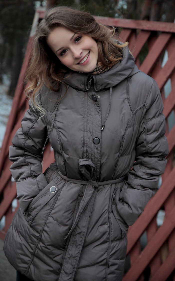 Young woman in a winter jacket outdoors