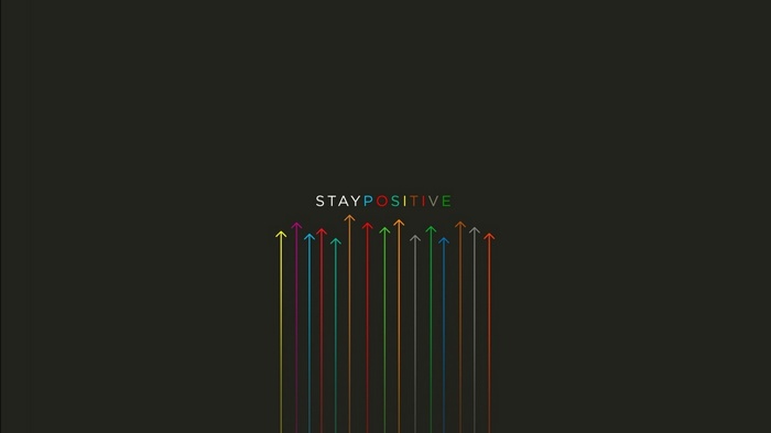 Stay Positive typography with colorful arrows