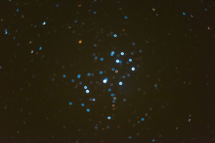 Bokeh lights in a dark sky
