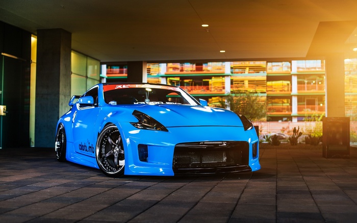 Blue Nissan 370Z sports car parked outdoors