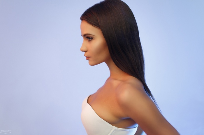Model Christina Makarova in profile with bare shoulders
