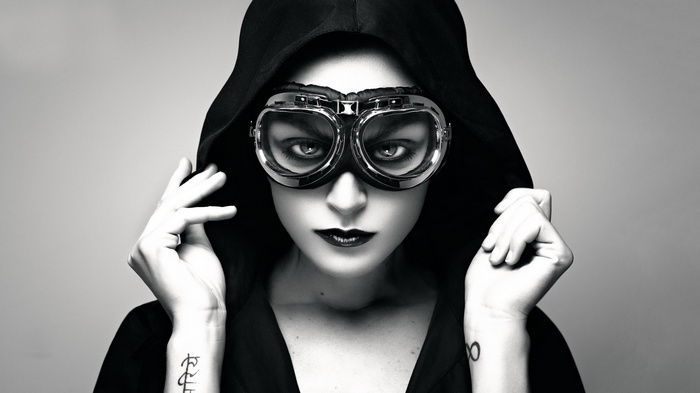 Woman wearing goggles and hood