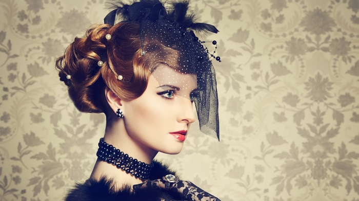 Woman with vintage hairstyle and veil