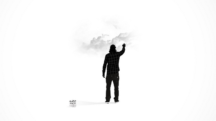 Man in plaid shirt pointing at clouds with spray cans