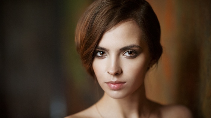 Woman's portrait with short brown hair