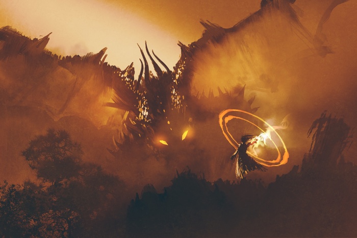 Dragon and wizard in a fiery landscape