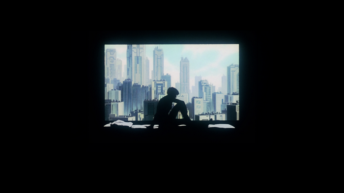 Motoko Kusanagi from Ghost in the Shell sitting by a futuristic cityscape