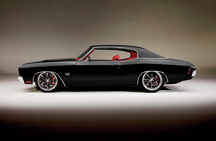 Black Chevrolet Chevelle SS lowrider with red interior