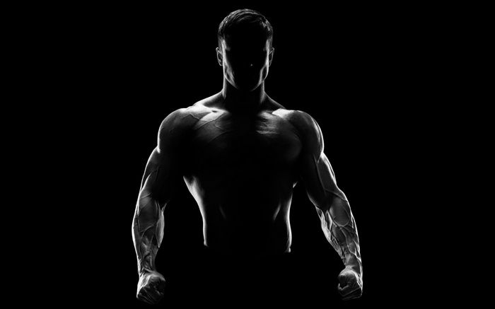 Muscular man in silhouette