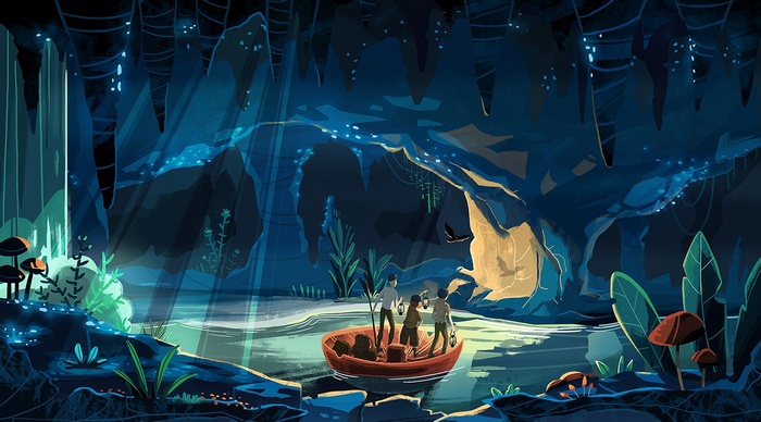 Three people in a boat exploring a glowing cave