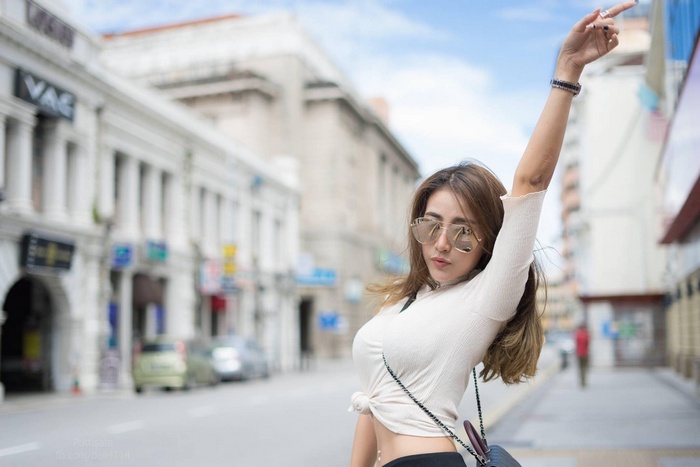 Phasinee Boonrod posing on a street in Thailand