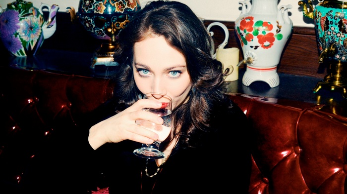 Regina Spektor drinking from a glass
