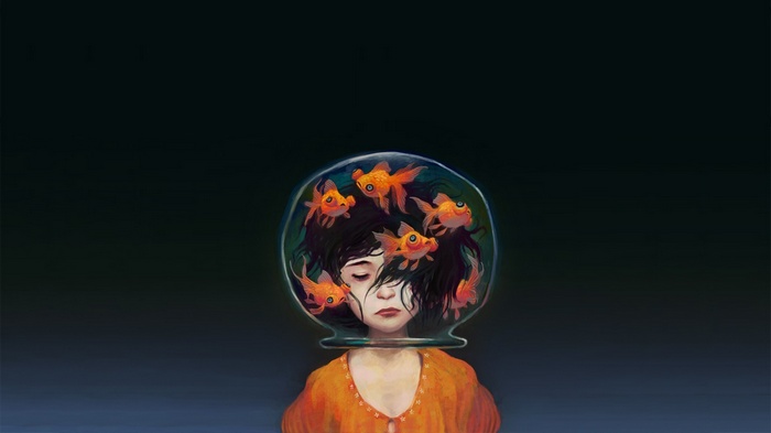 Girl with goldfish in a fishbowl on her head